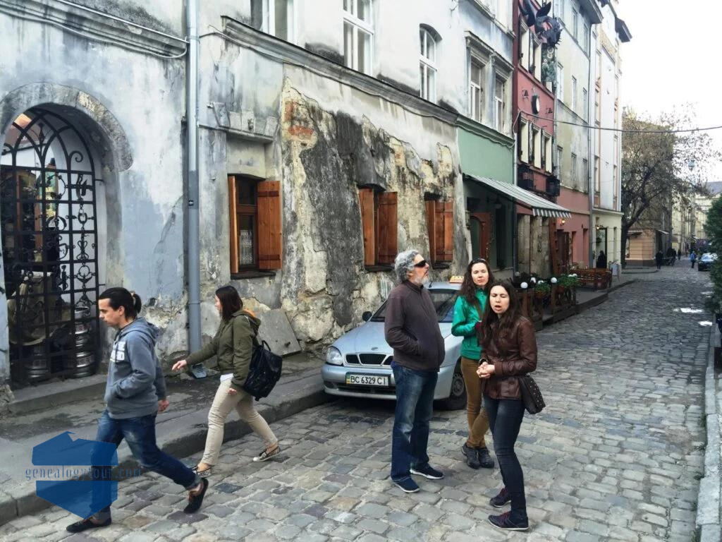family standing on the street, sightseeing